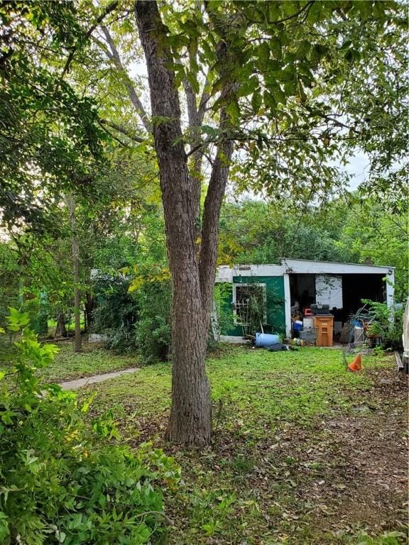 5512 Joe Sayers Ave, Austin, TX 78756 - view of yard with an outbuilding