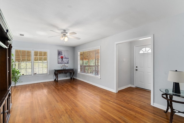 entrance foyer featuring hardwood / wood-style floors and ceiling fan