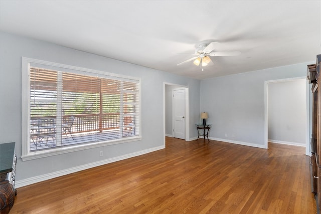 unfurnished room featuring ceiling fan and hardwood / wood-style floors