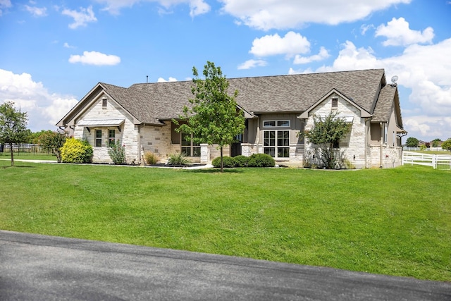 view of front of house with a front lawn