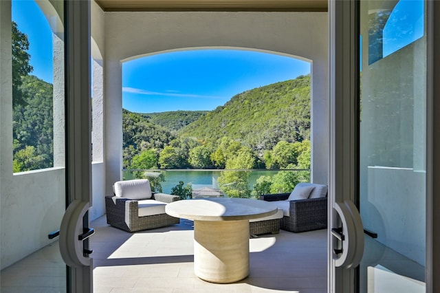 view of patio / terrace with a mountain view