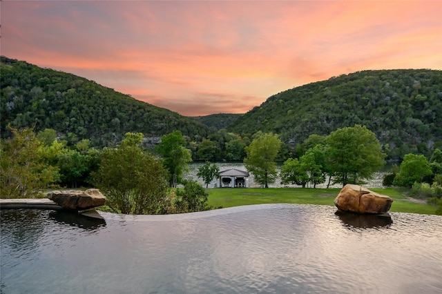 property view of mountains with a forest view