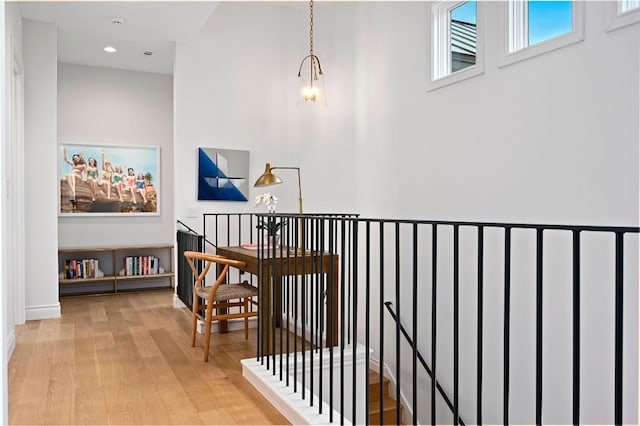 13414 Shore Vista Dr, Austin, TX 78732 - hall with an upstairs landing, wood finished floors, and recessed lighting