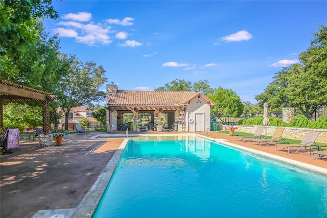 view of pool featuring a pergola and a patio area