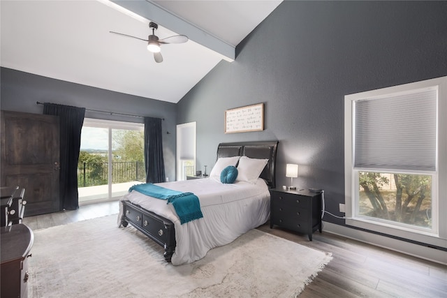 bedroom with ceiling fan, hardwood / wood-style floors, lofted ceiling with beams, and access to outside