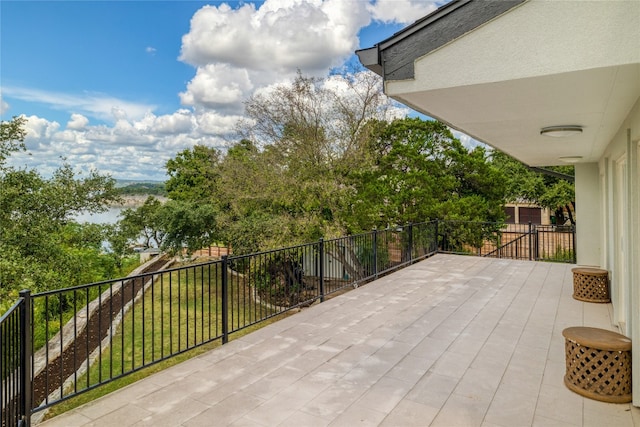 view of patio with a balcony