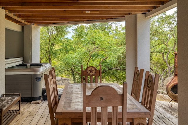 deck with a hot tub