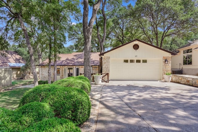 single story home featuring a garage