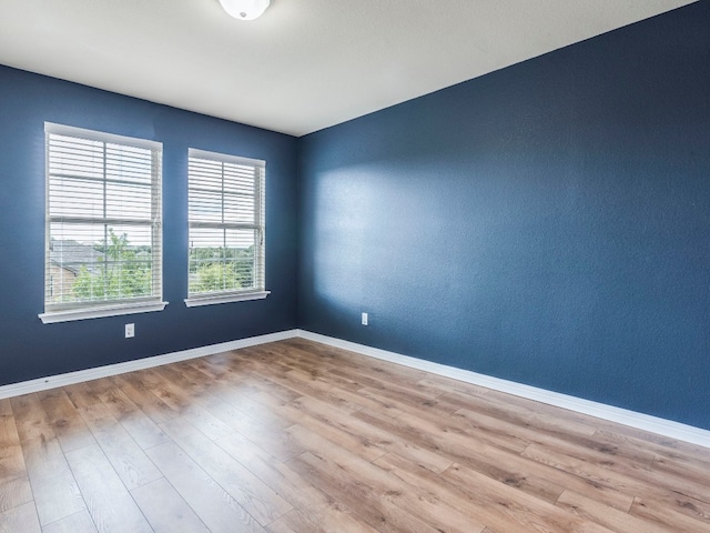 empty room with light wood-type flooring