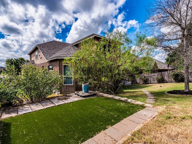 exterior space with a front yard