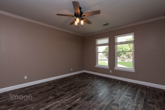 empty room featuring a textured ceiling, ceiling fan, ornamental molding, and dark wood-type flooring