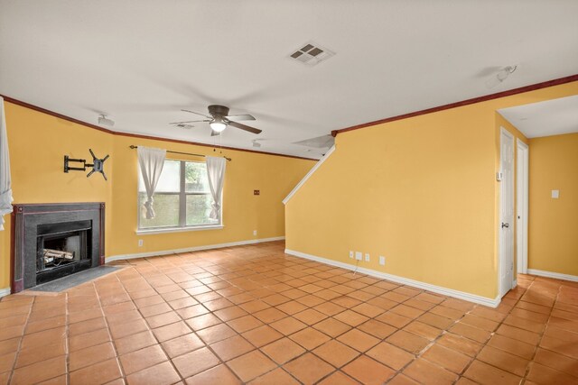 unfurnished living room featuring ornamental molding, light tile patterned floors, and ceiling fan