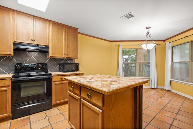 kitchen featuring ornamental molding, black electric range, a center island, decorative backsplash, and light tile patterned flooring