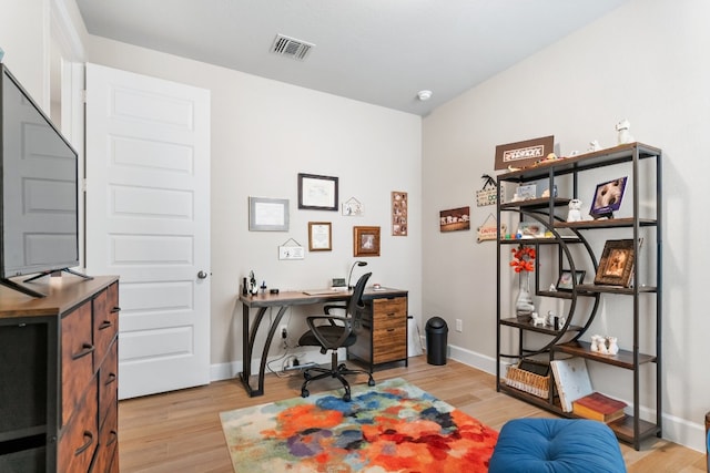 office featuring light hardwood / wood-style floors