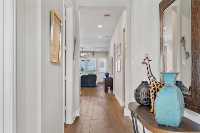 hall featuring hardwood / wood-style floors