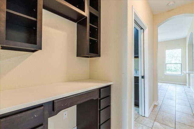 interior space featuring light tile patterned floors