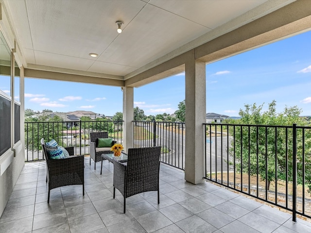 view of patio with a balcony