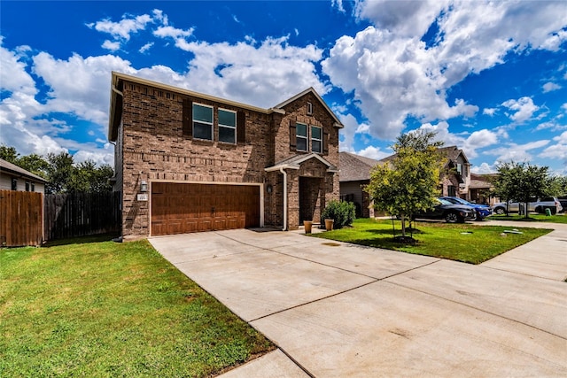 view of front of house featuring a garage and a front yard