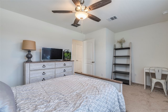 bedroom with ceiling fan and carpet