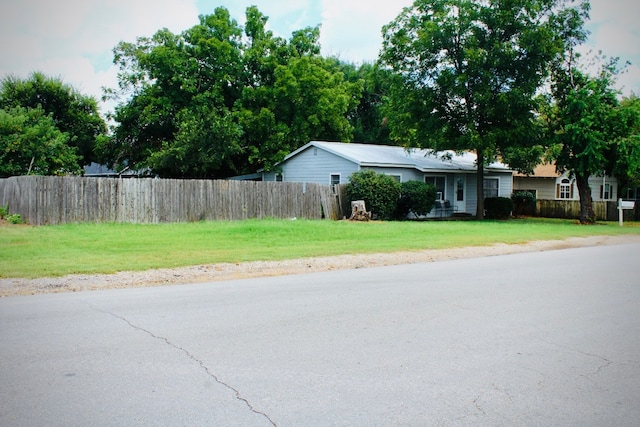 exterior space featuring a front yard