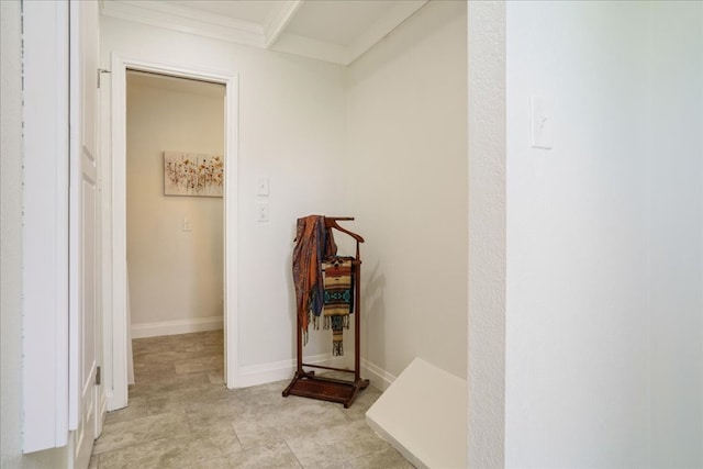 hall featuring ornamental molding