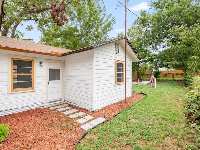 exterior space with a yard