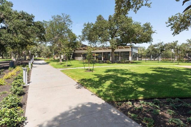 surrounding community featuring a lawn