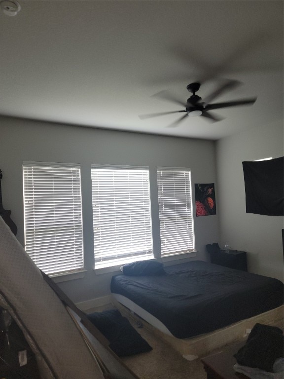 bedroom featuring ceiling fan