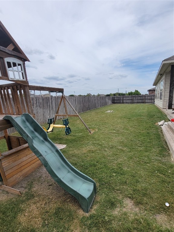 view of yard featuring a playground