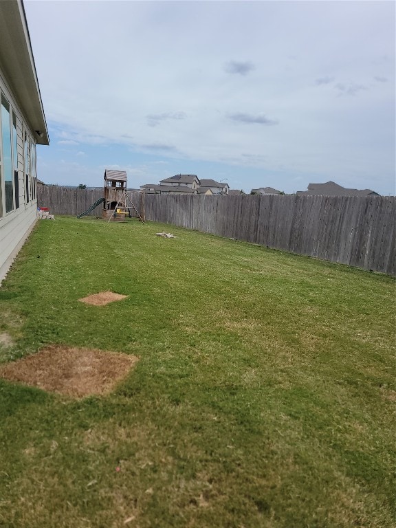 view of yard with a playground