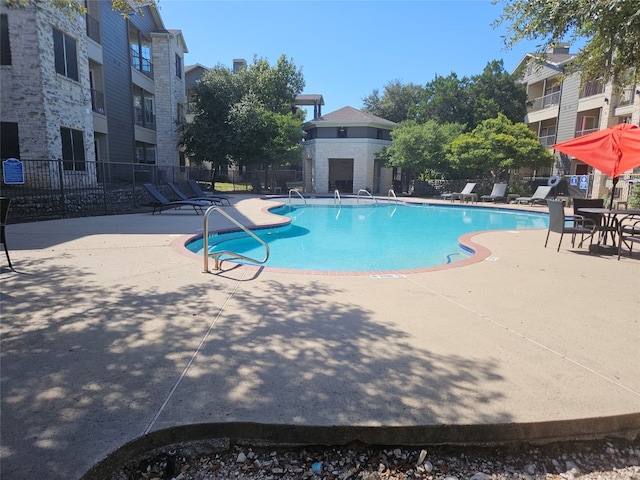 view of pool with a patio