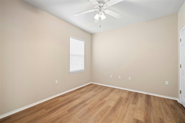 spare room with ceiling fan and light hardwood / wood-style flooring