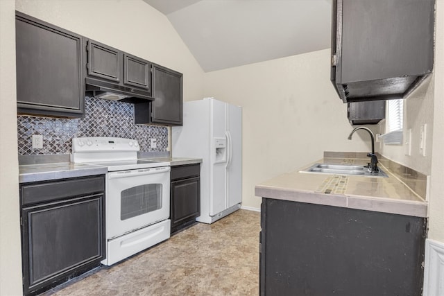 kitchen featuring backsplash, vaulted ceiling, sink, and white appliances