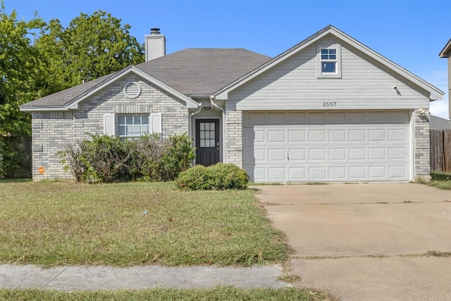 ranch-style house featuring a garage and a front yard