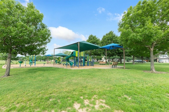 view of jungle gym featuring a lawn