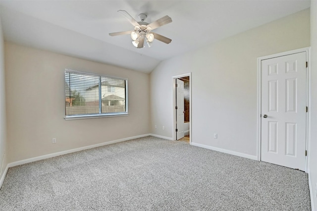 unfurnished bedroom with light colored carpet, ceiling fan, and lofted ceiling