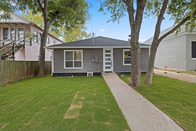 view of front of home with a front yard