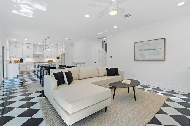 living room with ceiling fan