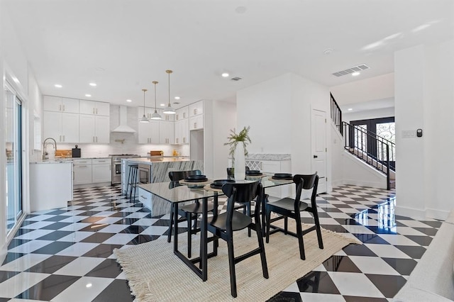 dining space with sink