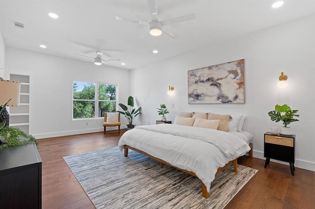 bedroom with hardwood / wood-style flooring and ceiling fan