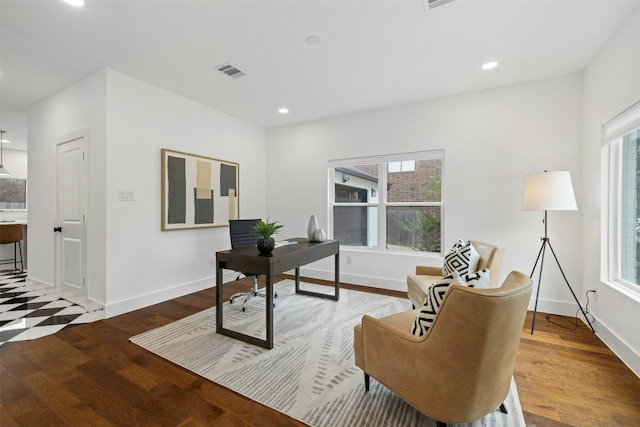 office featuring hardwood / wood-style flooring and plenty of natural light