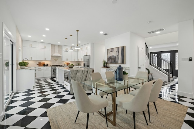 dining room featuring sink