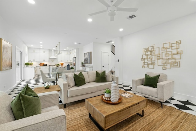 living room with ceiling fan