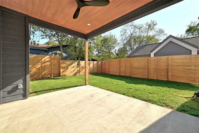 view of patio featuring ceiling fan