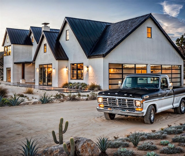 modern farmhouse with a garage