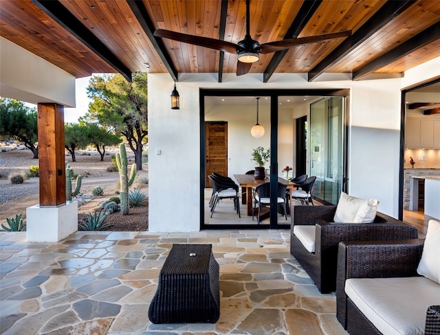 view of patio / terrace featuring ceiling fan