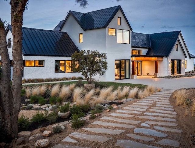 rear view of house with a patio