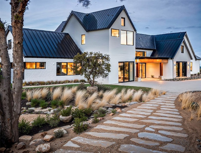 rear view of property with a patio area