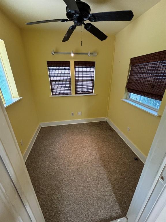 510 S Church St, Georgetown, TX 78626 - carpeted empty room with a ceiling fan and baseboards