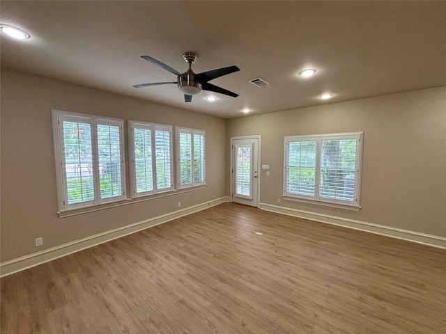 510 S Church St, Georgetown, TX 78626 - empty room with wood finished floors, a ceiling fan, and recessed lighting